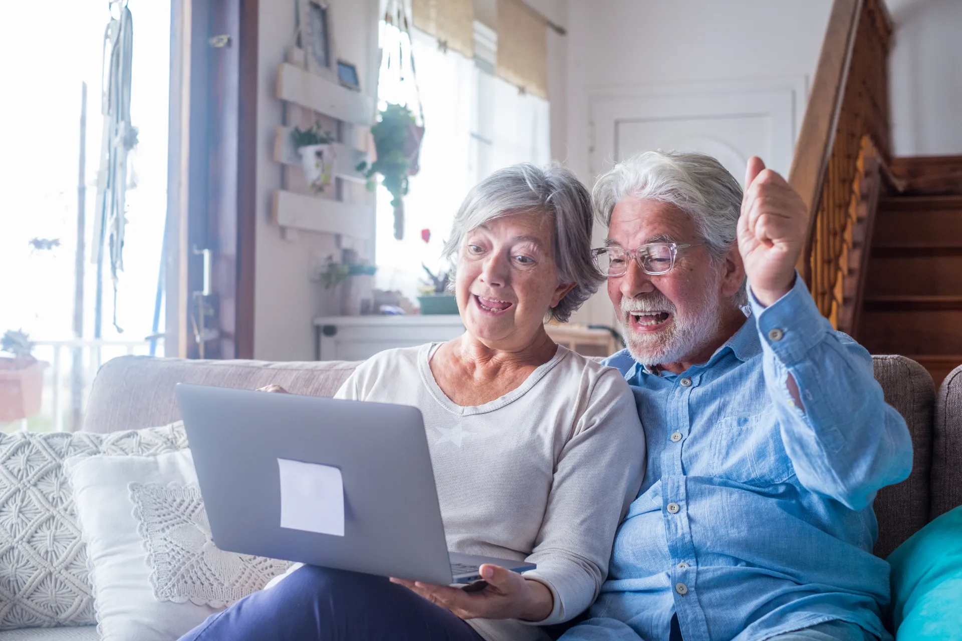 A couple watching their numbers drawn to win mega millions jackpot by playing multiple lotteries. They are trying to beat the odds and wonder how to win more in powerball.